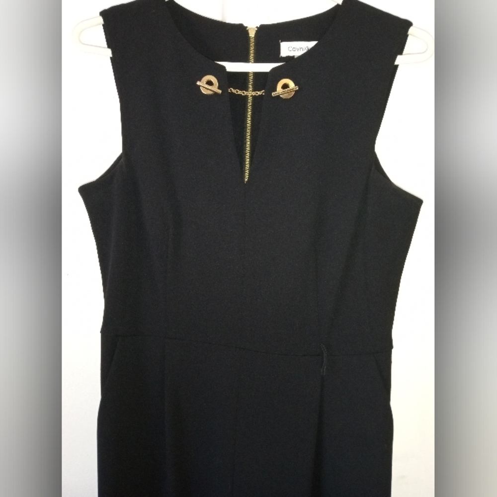 Calvin Klein size 4 black jumpsuit Gold chain detail gold zipper back